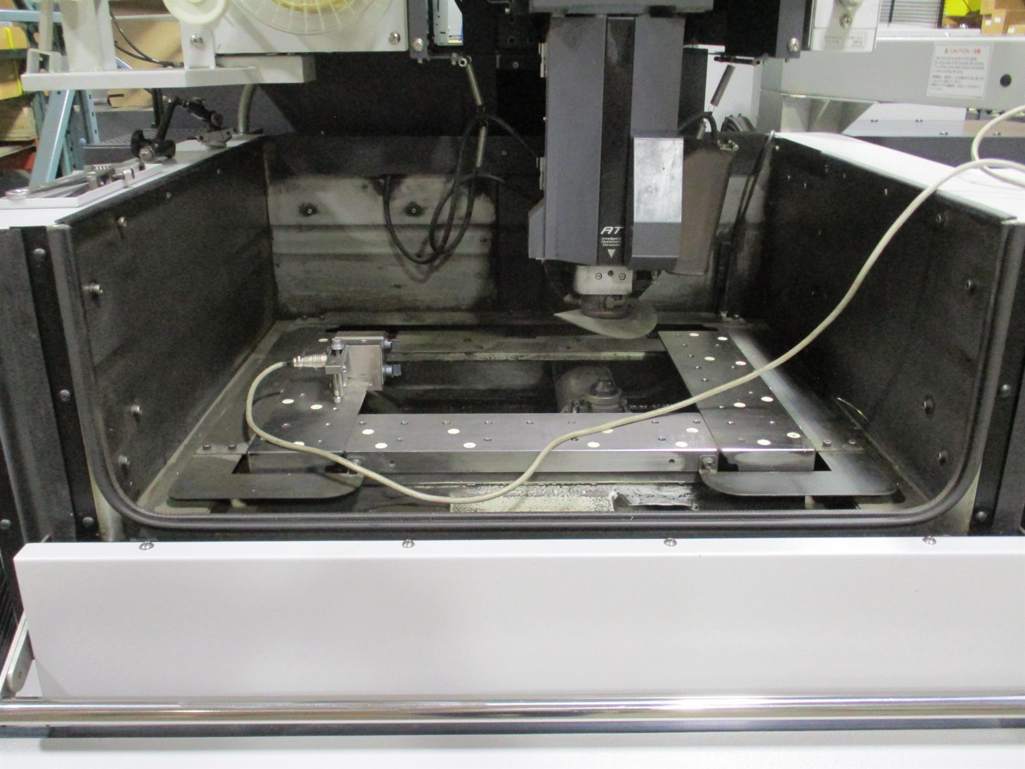 inner mechanisms of the Mitsubishi MC1200S MED+PRO3 CNC Wire EDM