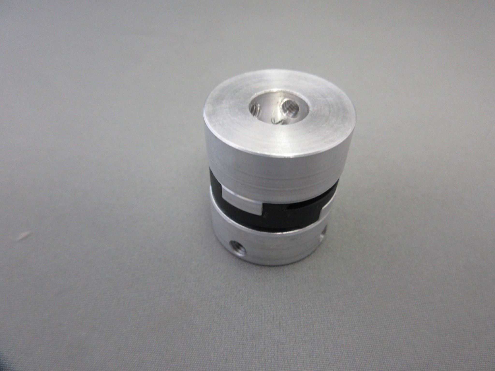 COUPLER FOR PINCH ROLLER MOTOR